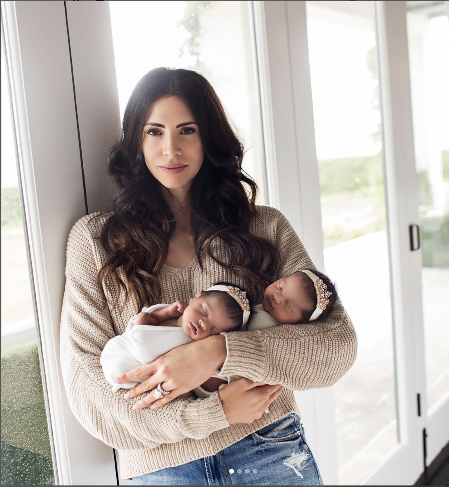 Hope Smith holding twins